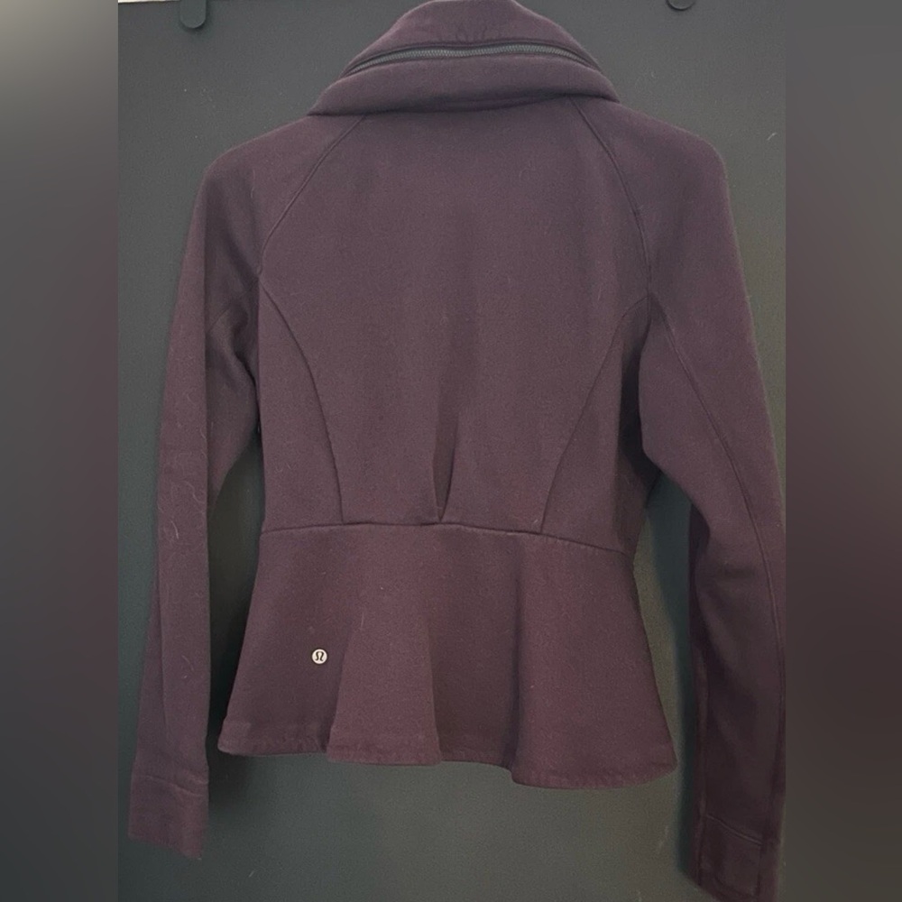 Like new maybe never worn ever RARE peplum lululemon jacket size 8